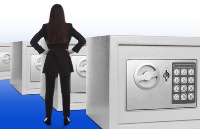 Financial security, keeping money. Businesswoman and many big steel safes on white background