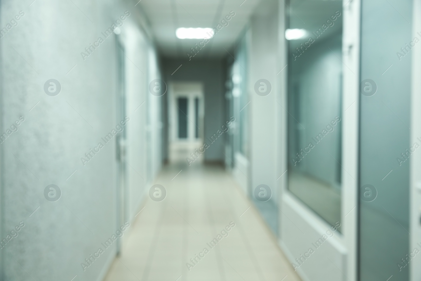 Photo of Blurred view of empty corridor in modern hospital