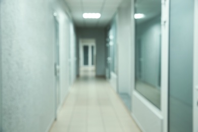 Photo of Blurred view of empty corridor in modern hospital
