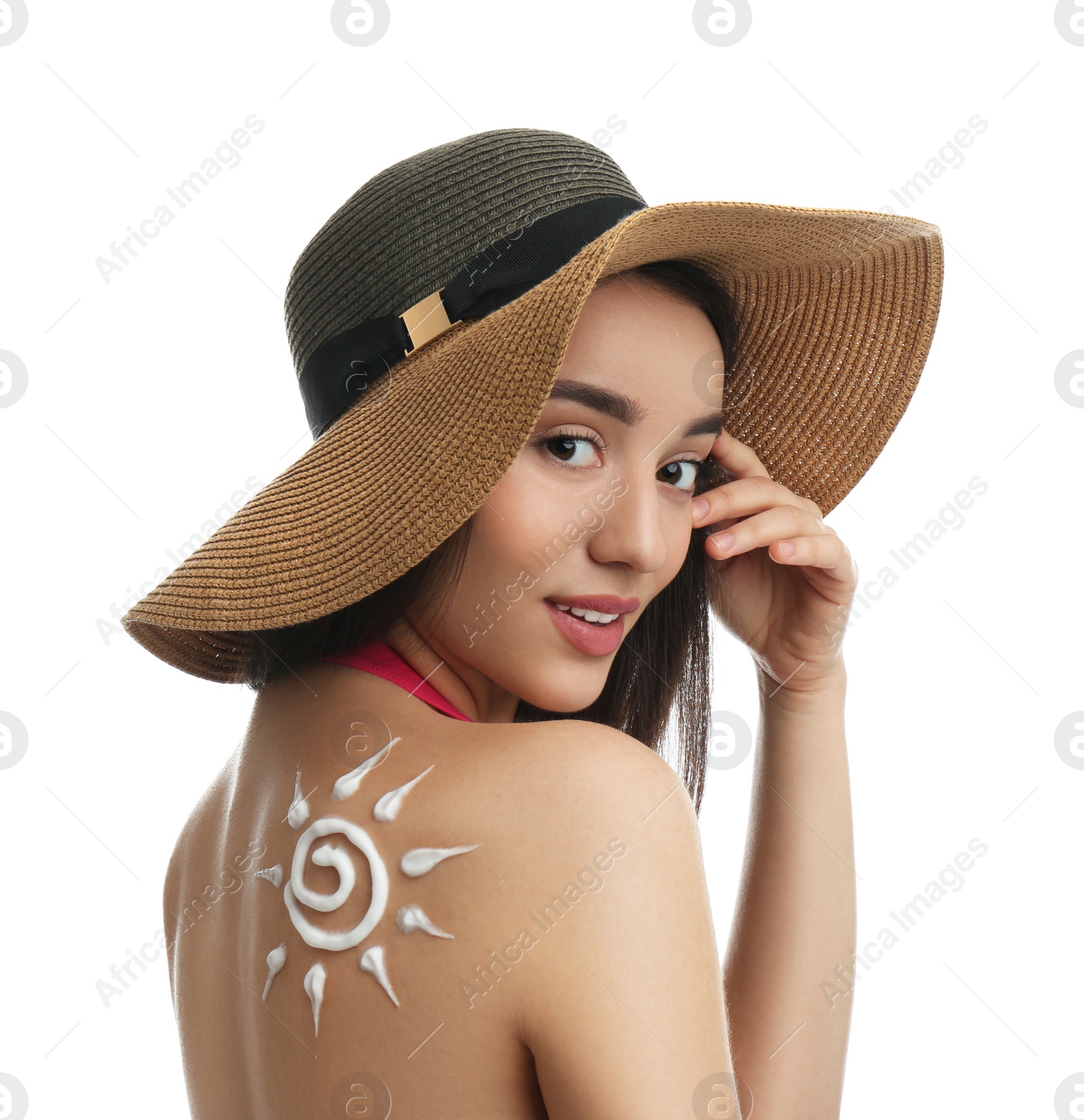 Photo of Young woman with sun protection cream on her back against white background