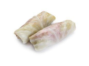 Photo of Uncooked stuffed cabbage rolls isolated on white
