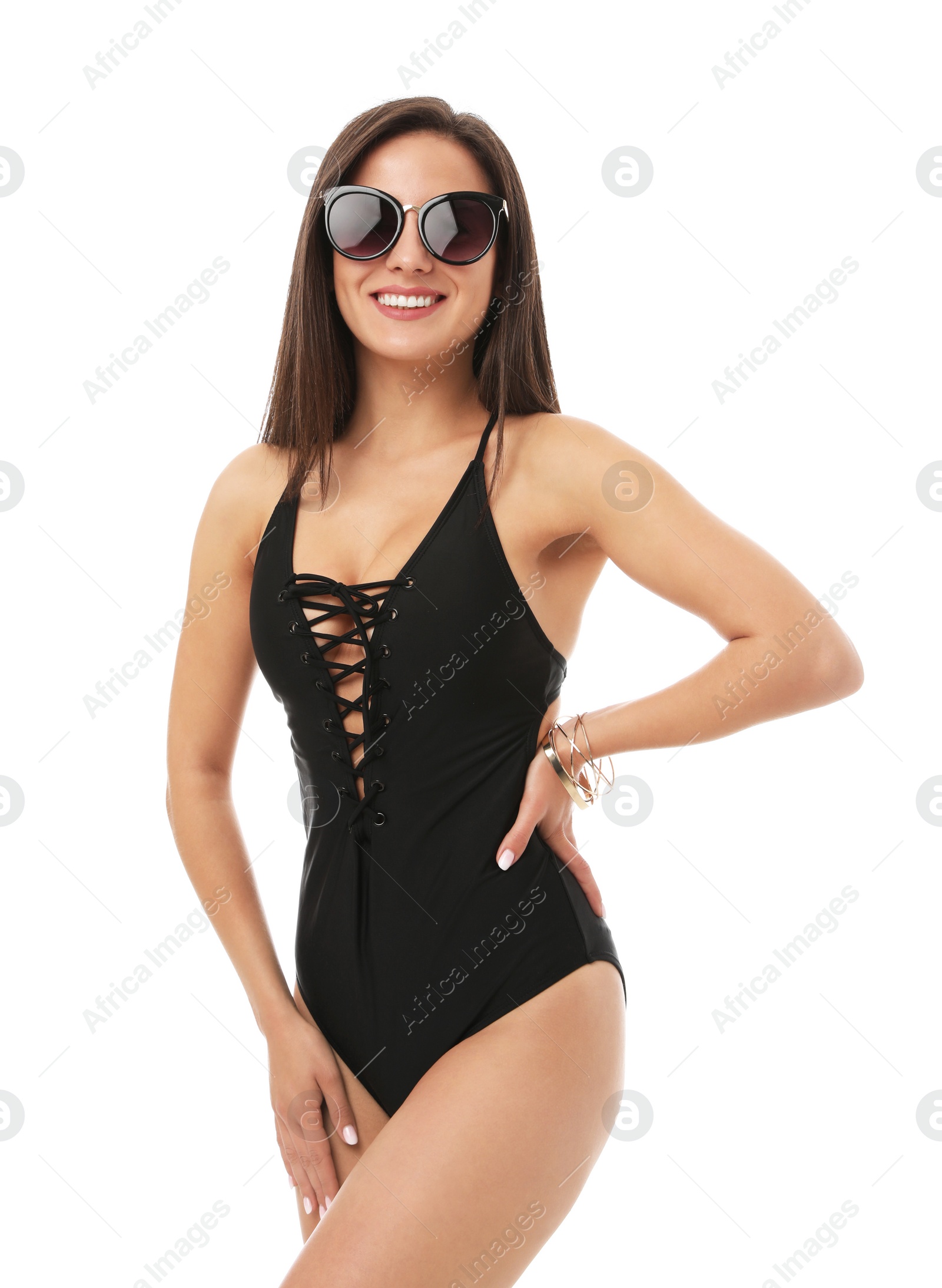 Photo of Pretty sexy woman with slim body in stylish black bikini on white background