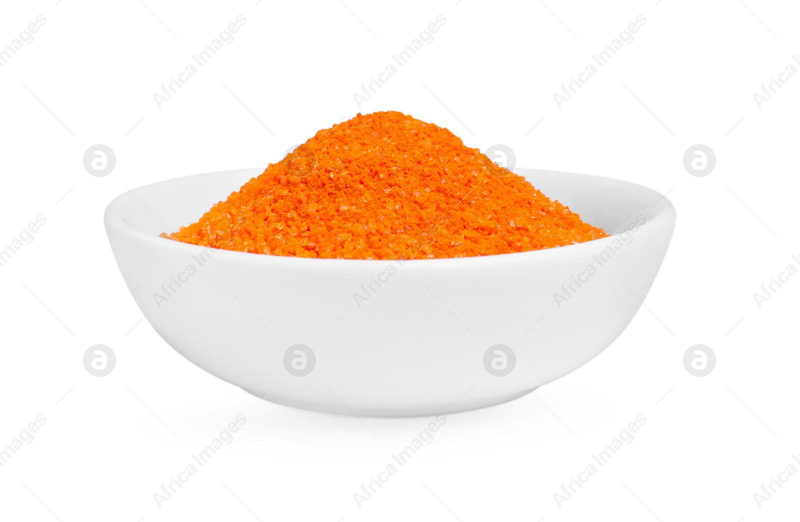 Photo of Bowl with orange food coloring isolated on white