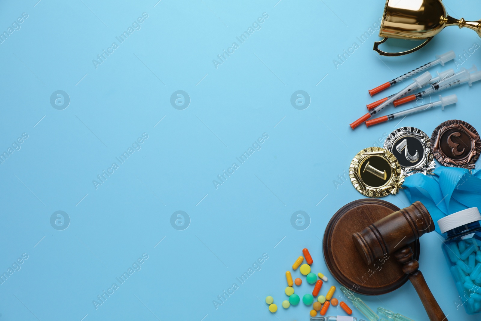 Photo of Flat lay composition with drugs on light blue background, space for text. Doping control