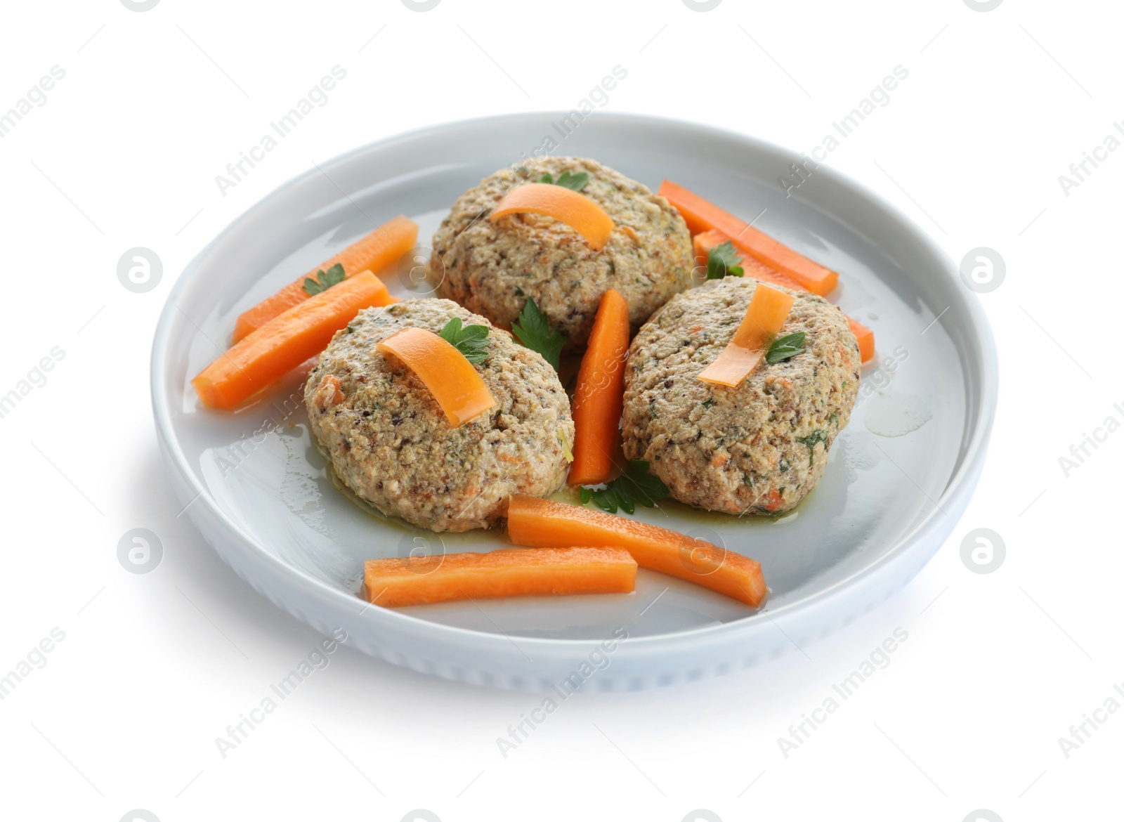 Photo of Plate of traditional Passover (Pesach) gefilte fish on white background