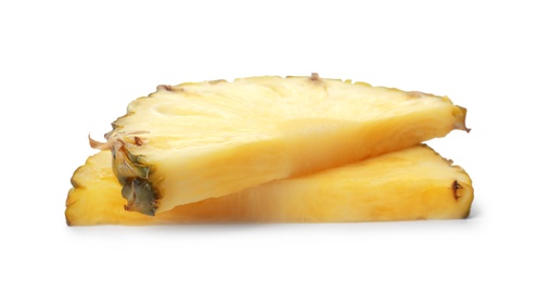 Slices of tasty juicy pineapple on white background