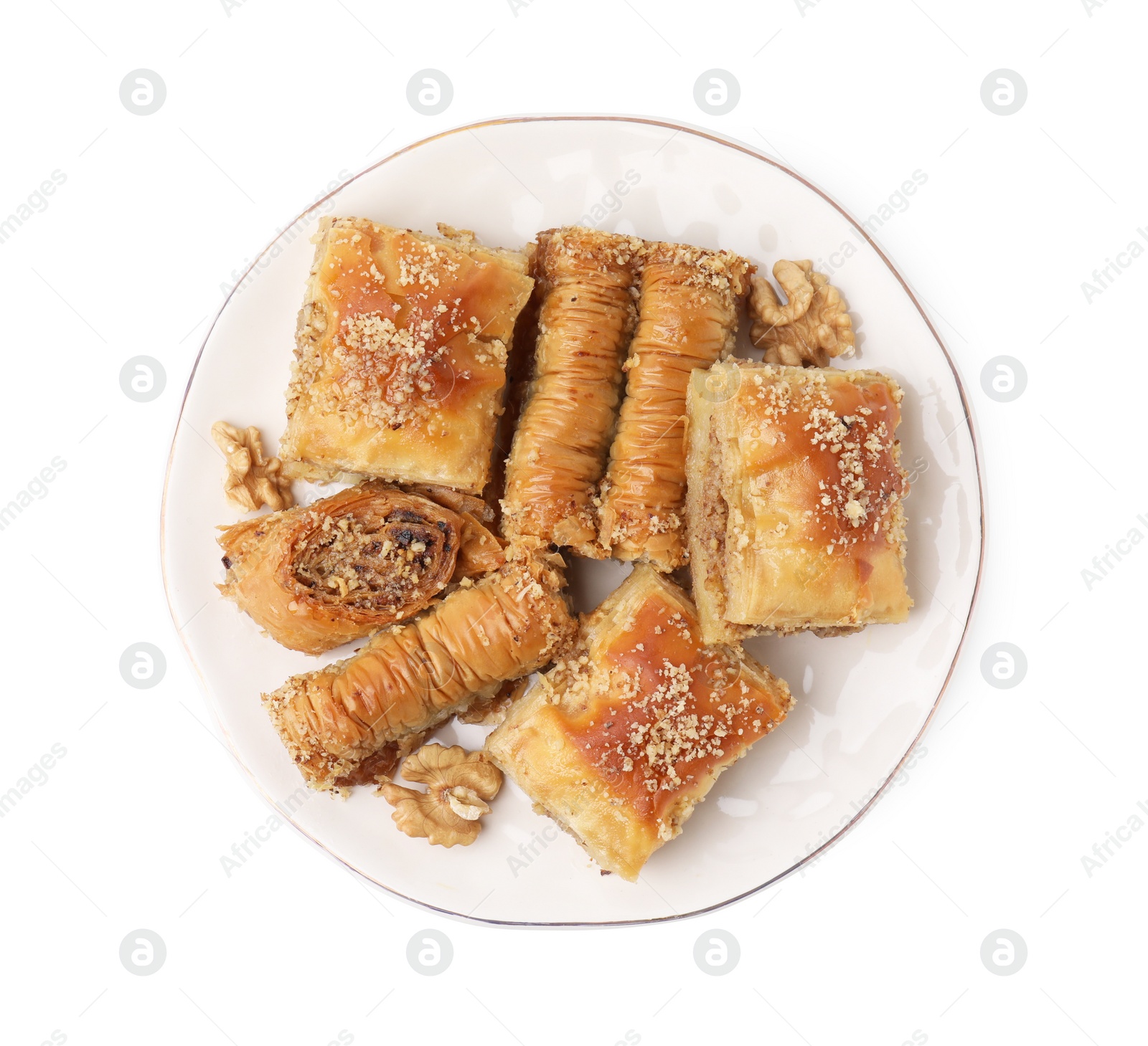 Photo of Eastern sweets. Pieces of tasty baklava isolated on white, top view