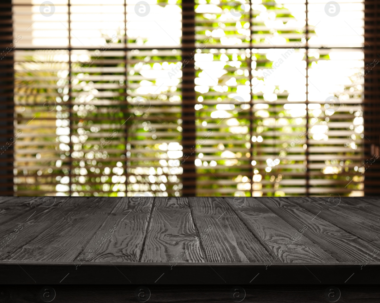 Image of Empty black wooden surface in room. Mockup for design