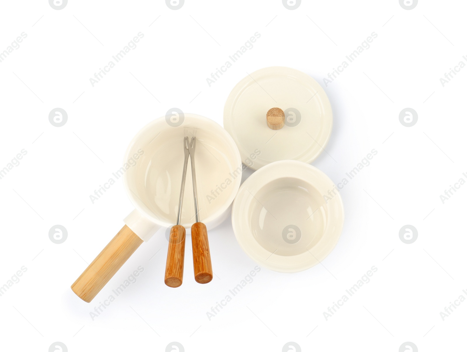 Photo of Fondue set isolated on white, top view. Kitchen equipment