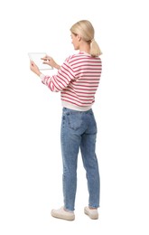 Woman using tablet with blank screen on white background