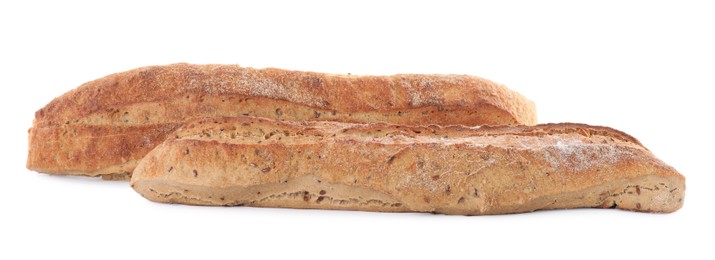 Photo of Tasty buckwheat baguettes on white background. Fresh bread