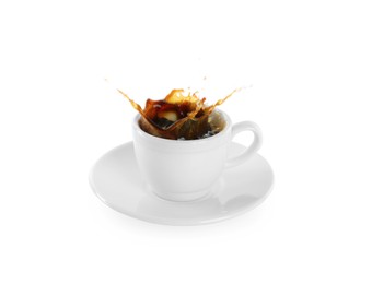 Coffee splashing out of cup on white background