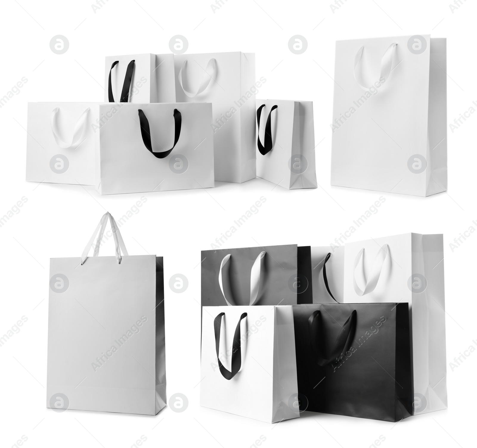 Image of Set with different paper shopping bags on white background