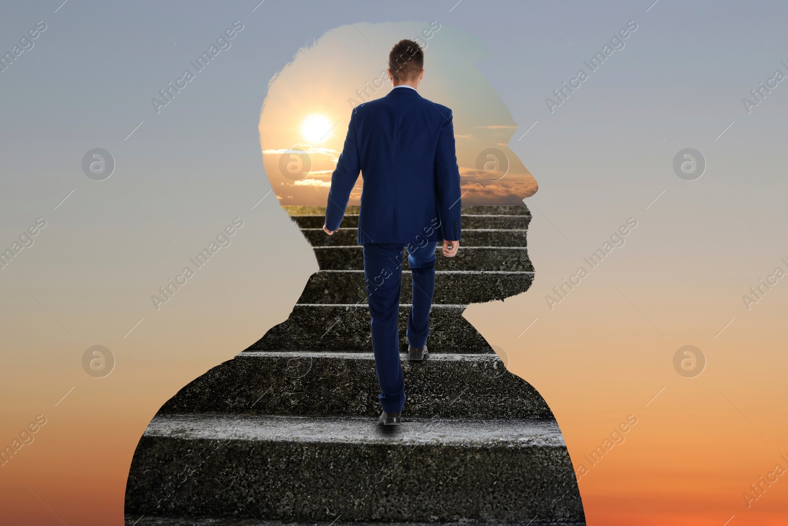 Image of Thinking about steps to success. Businessman climbing up stairs inside of man's silhouette