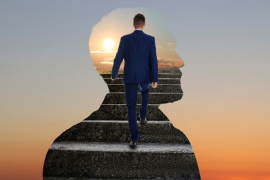 Image of Thinking about steps to success. Businessman climbing up stairs inside of man's silhouette