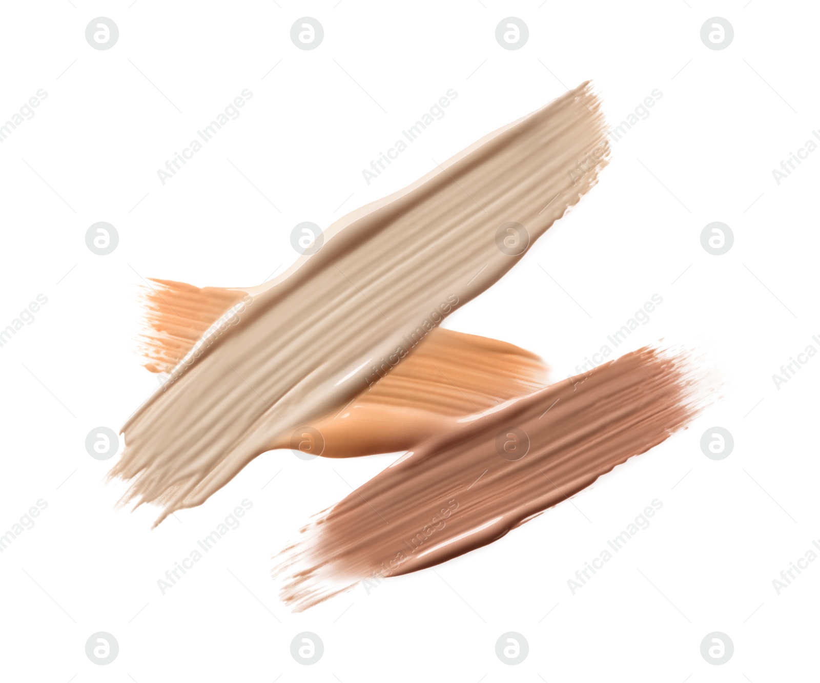 Image of Different shades of liquid foundation on white background, top view