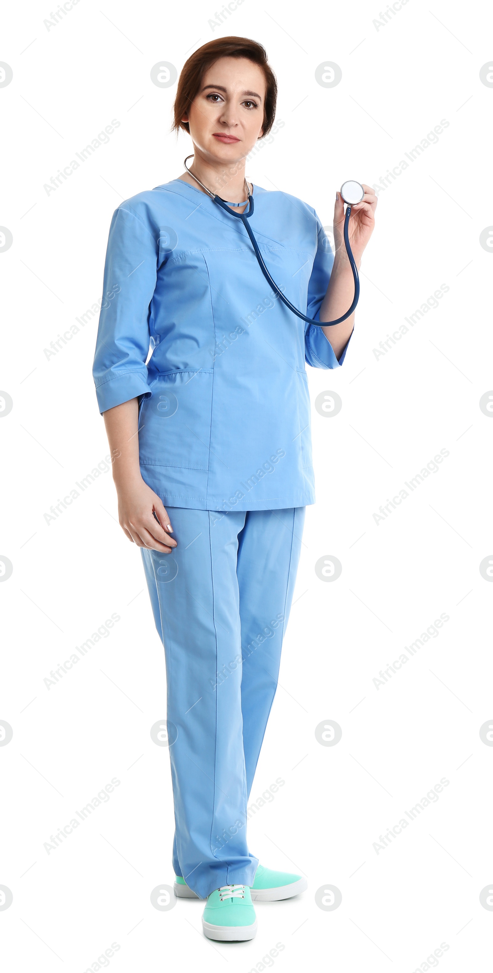 Photo of Full length portrait of experienced doctor in uniform on white background. Medical service