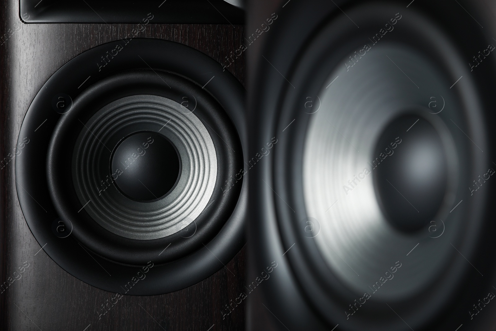 Photo of Two modern sound speakers as background, closeup