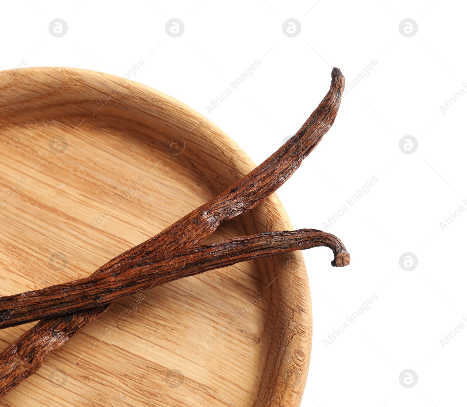 Photo of Plate with aromatic vanilla sticks on white background