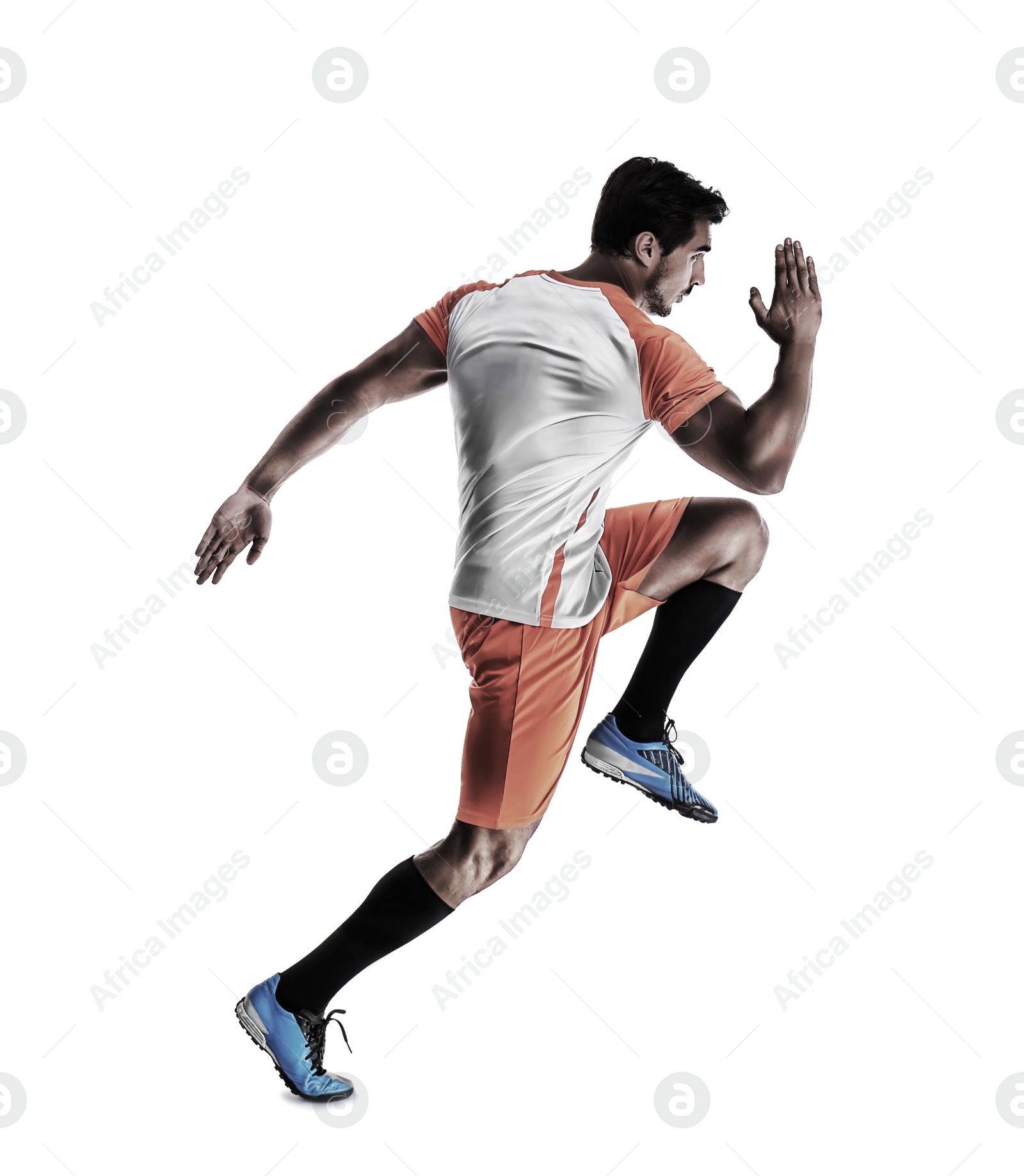 Image of Young man playing football on white background