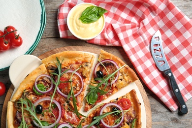 Flat lay composition with tasty homemade pizza on table