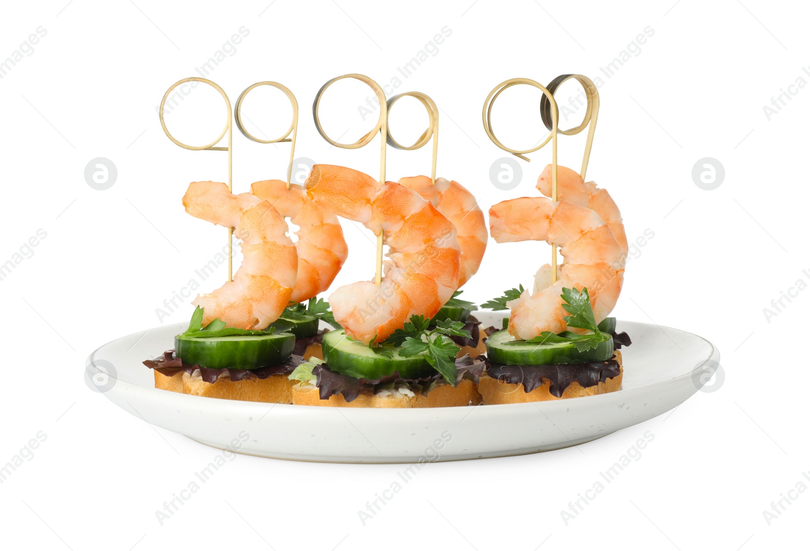 Photo of Tasty canapes with shrimps, greens and cucumber isolated on white