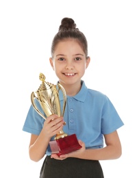 Photo of Happy girl in school uniform with golden winning cup isolated on white