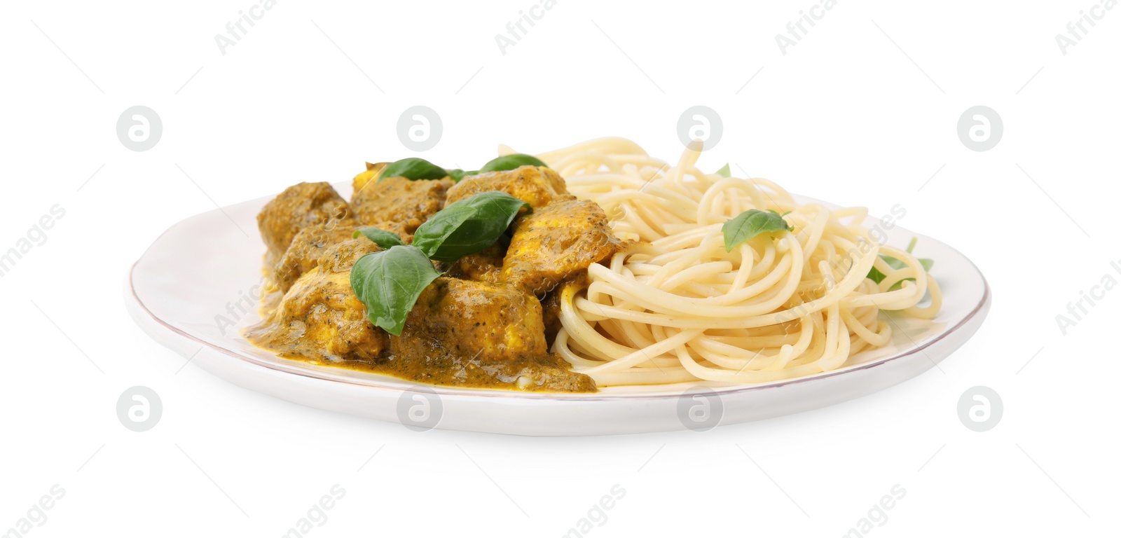 Photo of Delicious pasta and chicken with curry sauce isolated on white