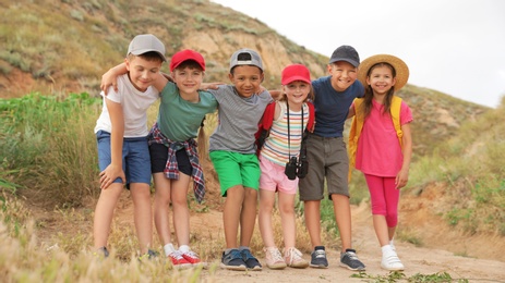 Cute little children outdoors on summer day. Camping trip