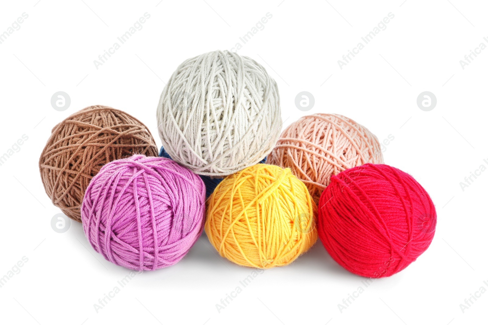 Photo of Soft colorful woolen yarns on white background