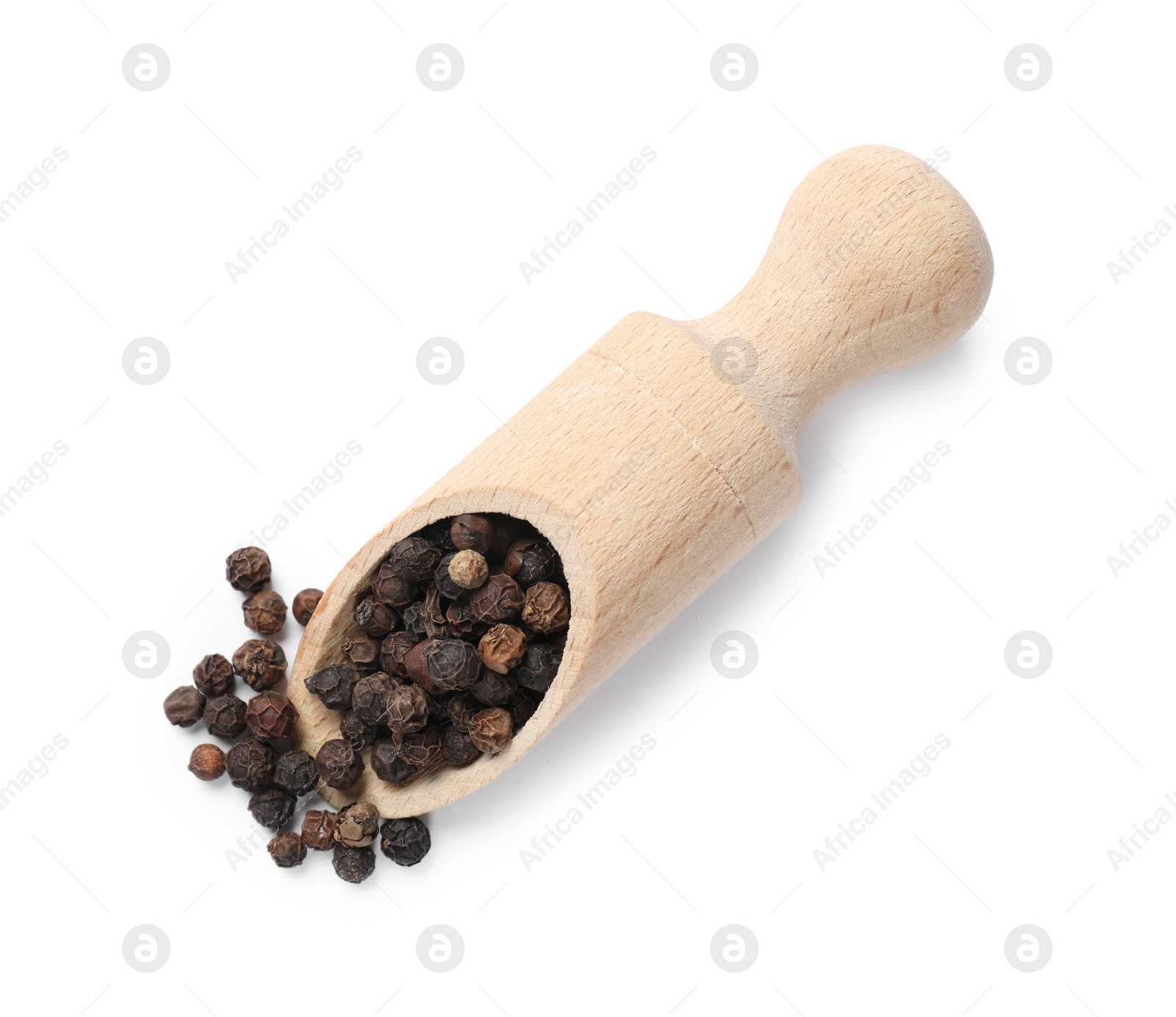 Photo of Aromatic spice. Many black peppercorns in scoop isolated on white, top view