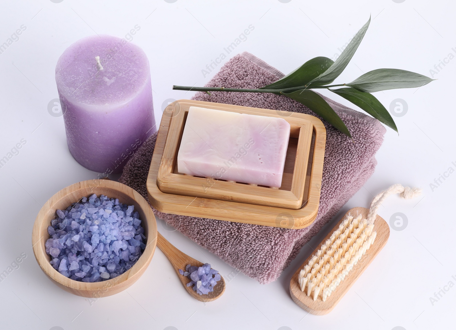 Photo of Composition with spa products and candle isolated on white