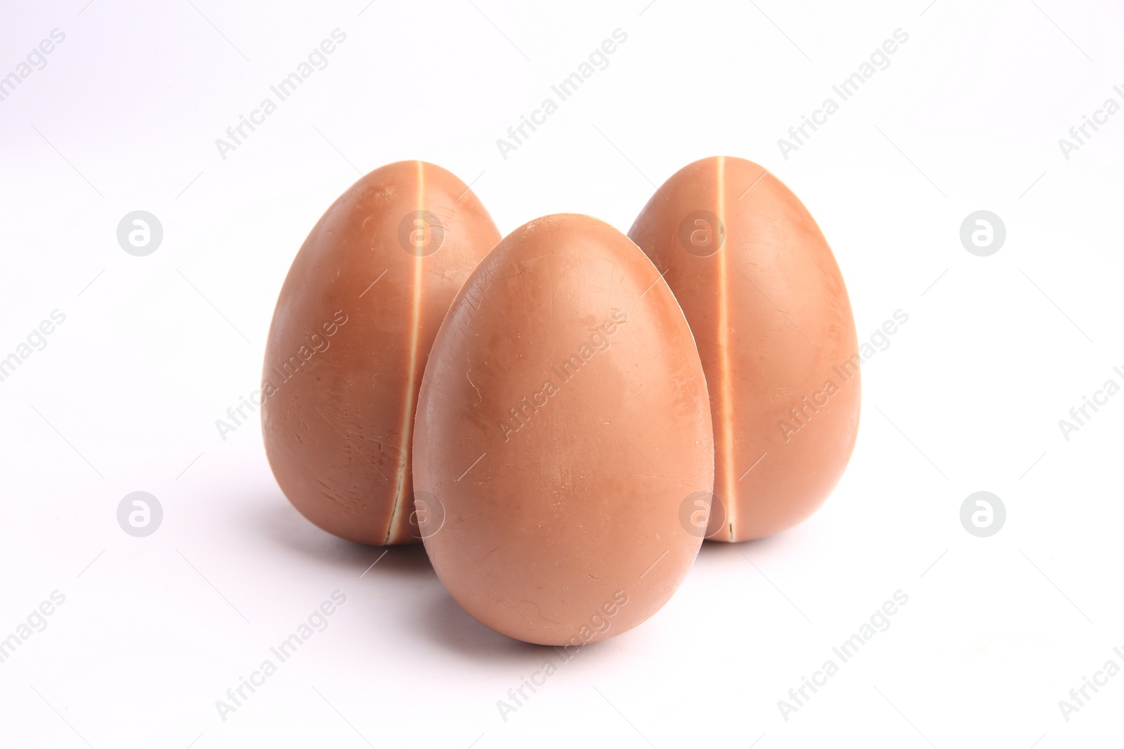 Photo of Sveti Vlas, Bulgaria - June 27, 2023: Unwrapped Kinder Surprise Eggs isolated on white