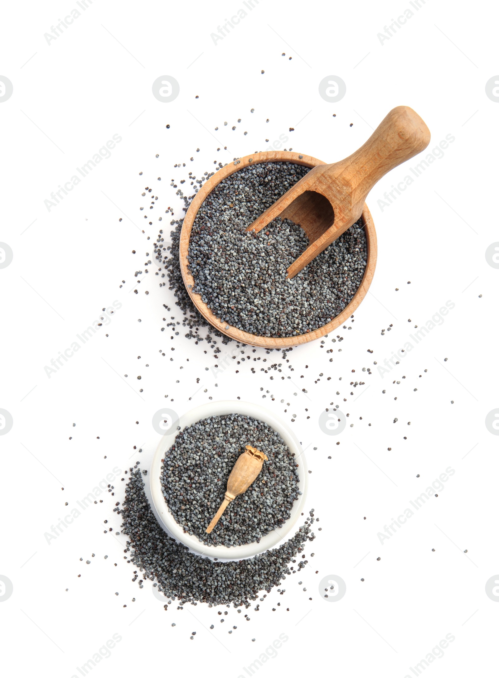Photo of Bowls with poppy seeds on white background