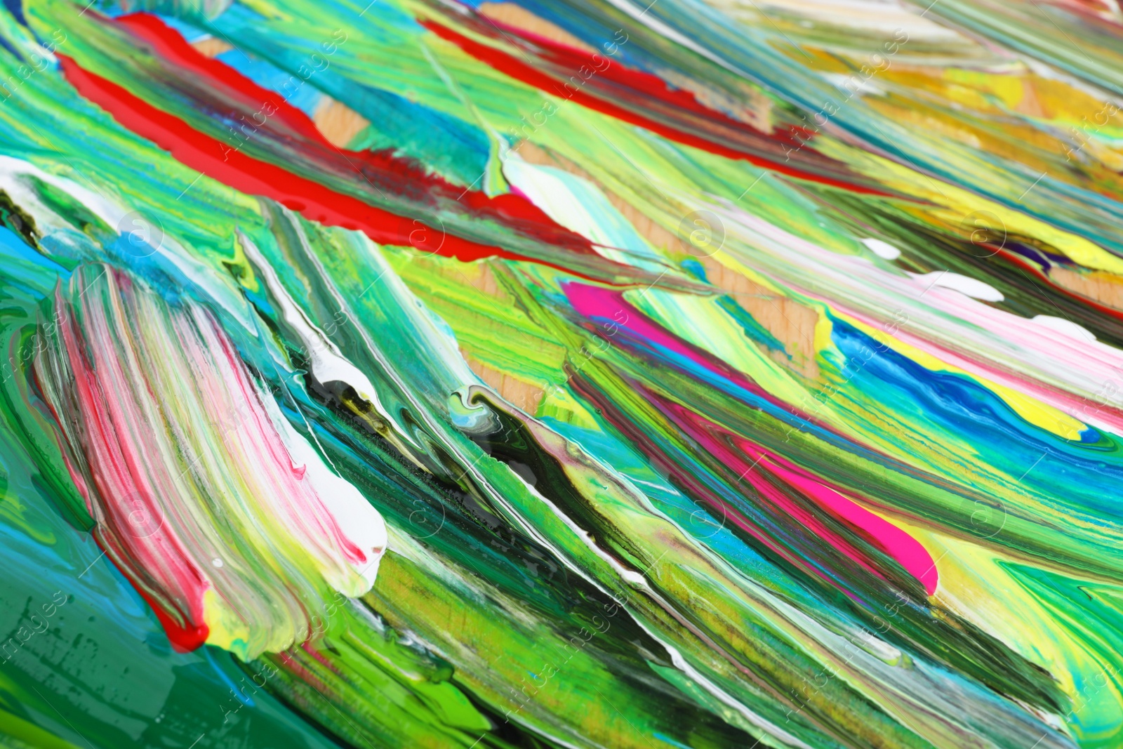 Photo of Abstract colorful acrylic paint as background, closeup view