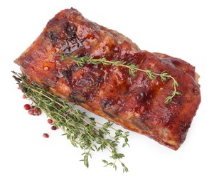 Tasty roasted pork ribs and thyme isolated on white, top view