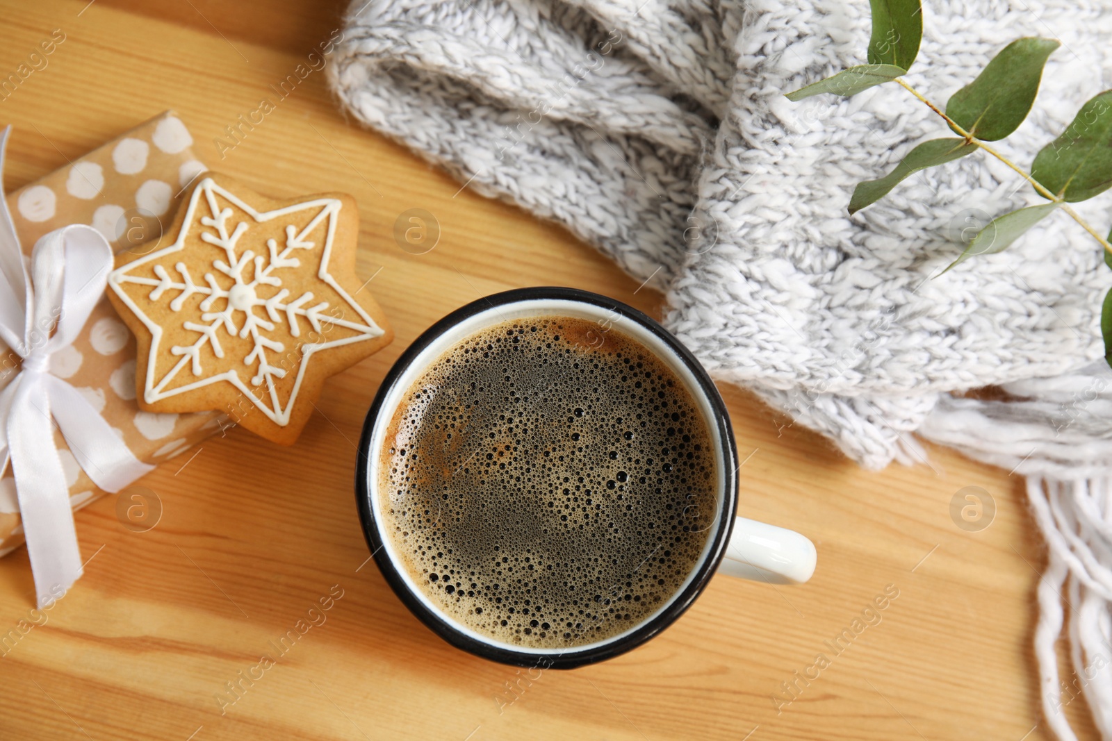 Photo of Flat lay composition with cup of hot winter drink on wooden background. Cozy season