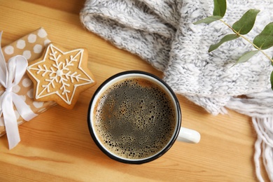 Photo of Flat lay composition with cup of hot winter drink on wooden background. Cozy season