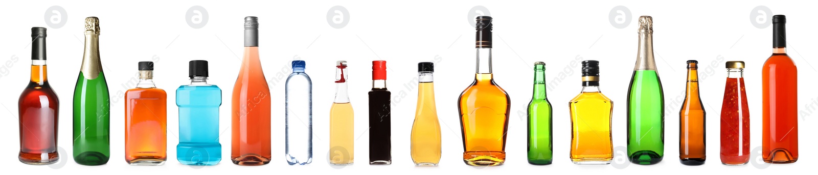 Image of Set of bottles with different liquids on white background. Banner design