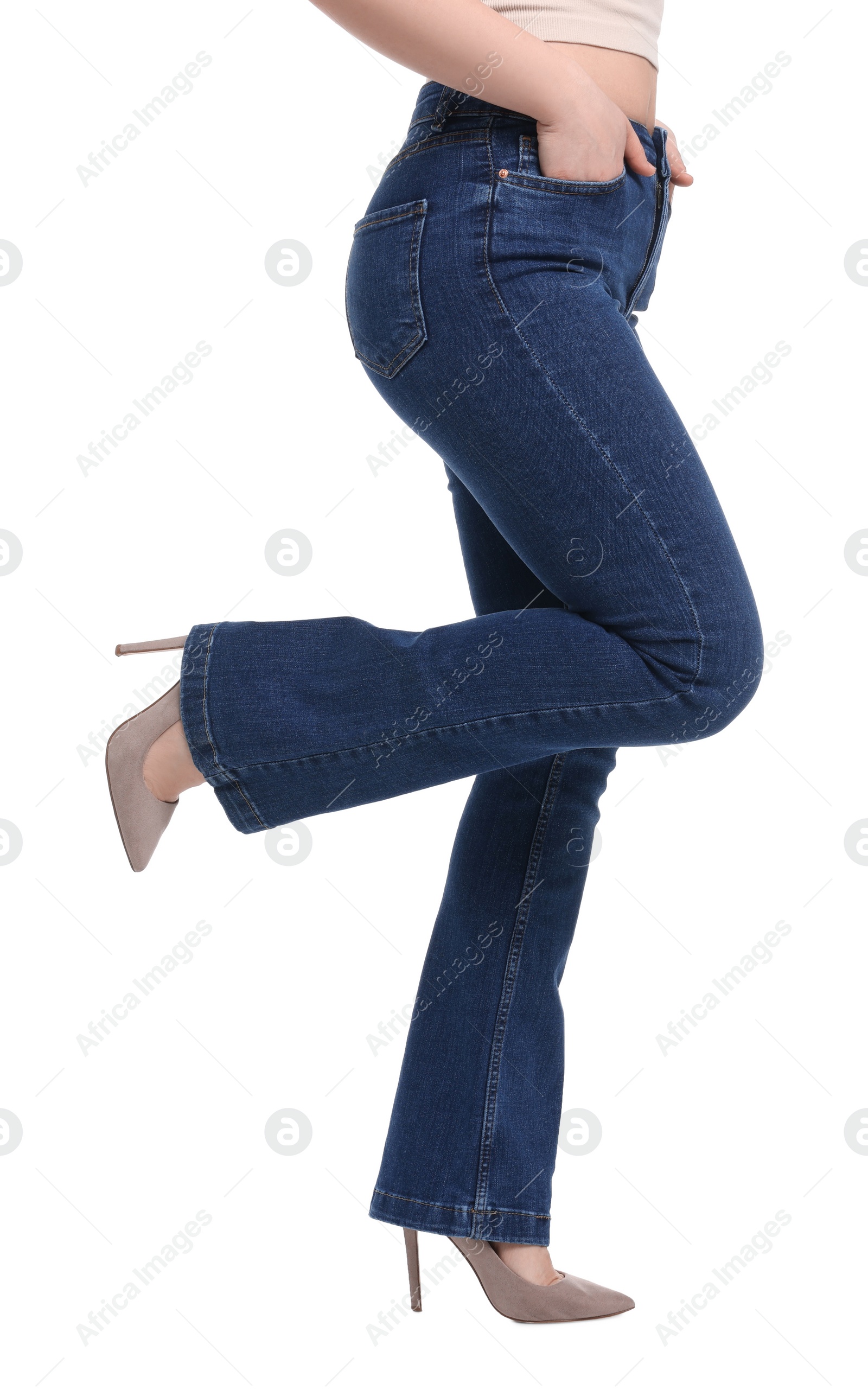 Photo of Woman in stylish jeans on white background, closeup