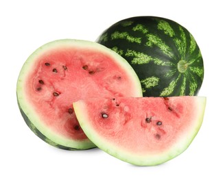 Photo of Whole and cut delicious ripe watermelons on white background