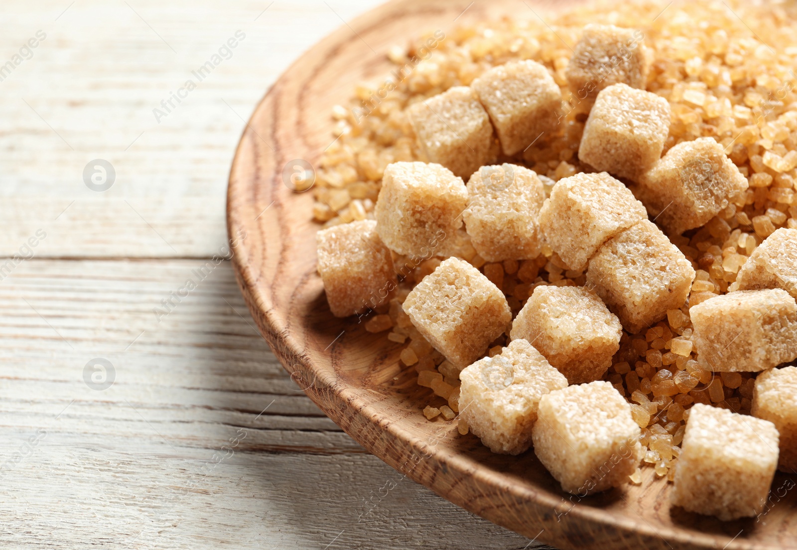 Photo of Plate with brown sugar, closeup