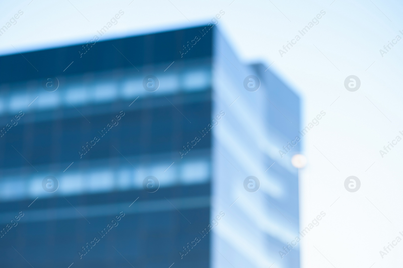 Photo of Blurred view of modern building on sunny day