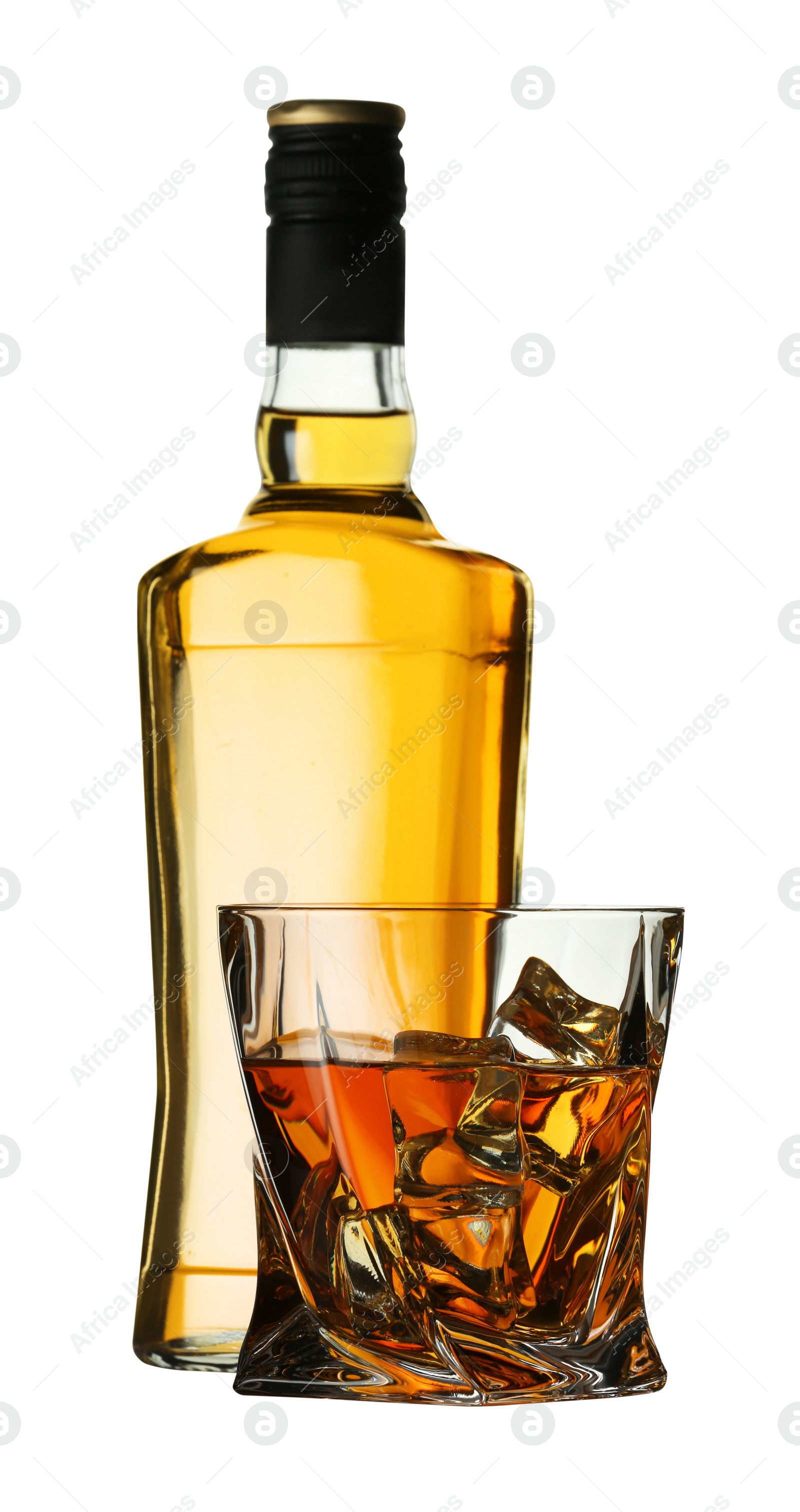 Photo of Whiskey in glass and bottle isolated on white