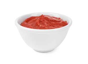 Photo of Organic ketchup in bowl isolated on white. Tomato sauce