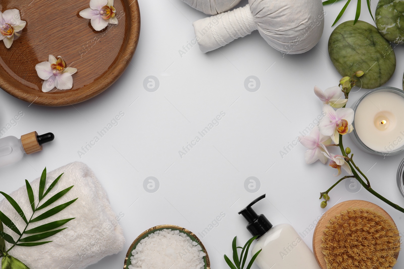 Photo of Flat lay composition with different spa products on white background. Space for text