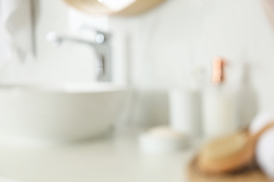 Photo of Blurred view of stylish modern bathroom with vessel sink