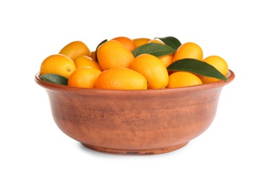 Fresh ripe kumquats with leaves in bowl on white background. Exotic fruit