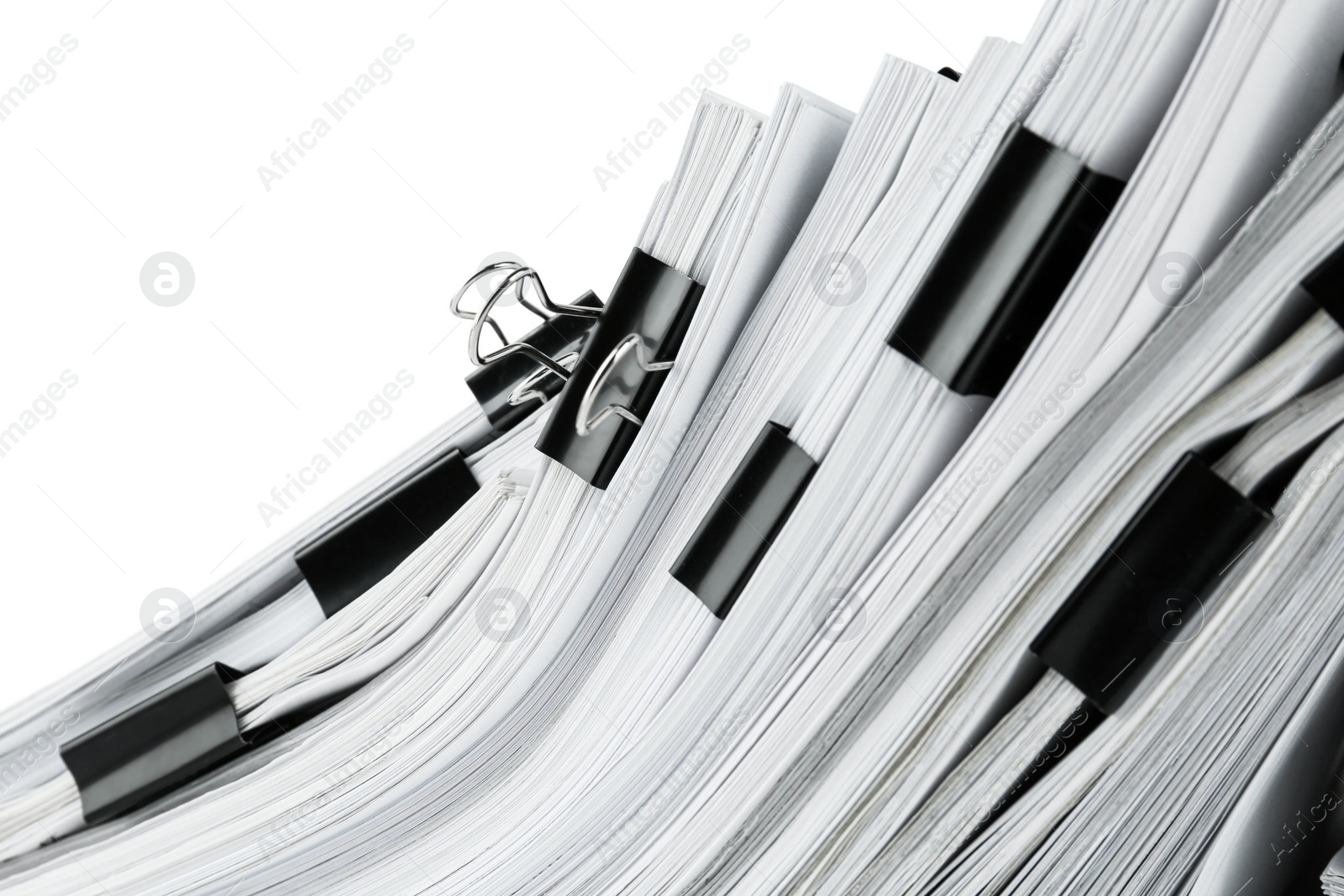 Photo of Pile of documents with binder clips, closeup