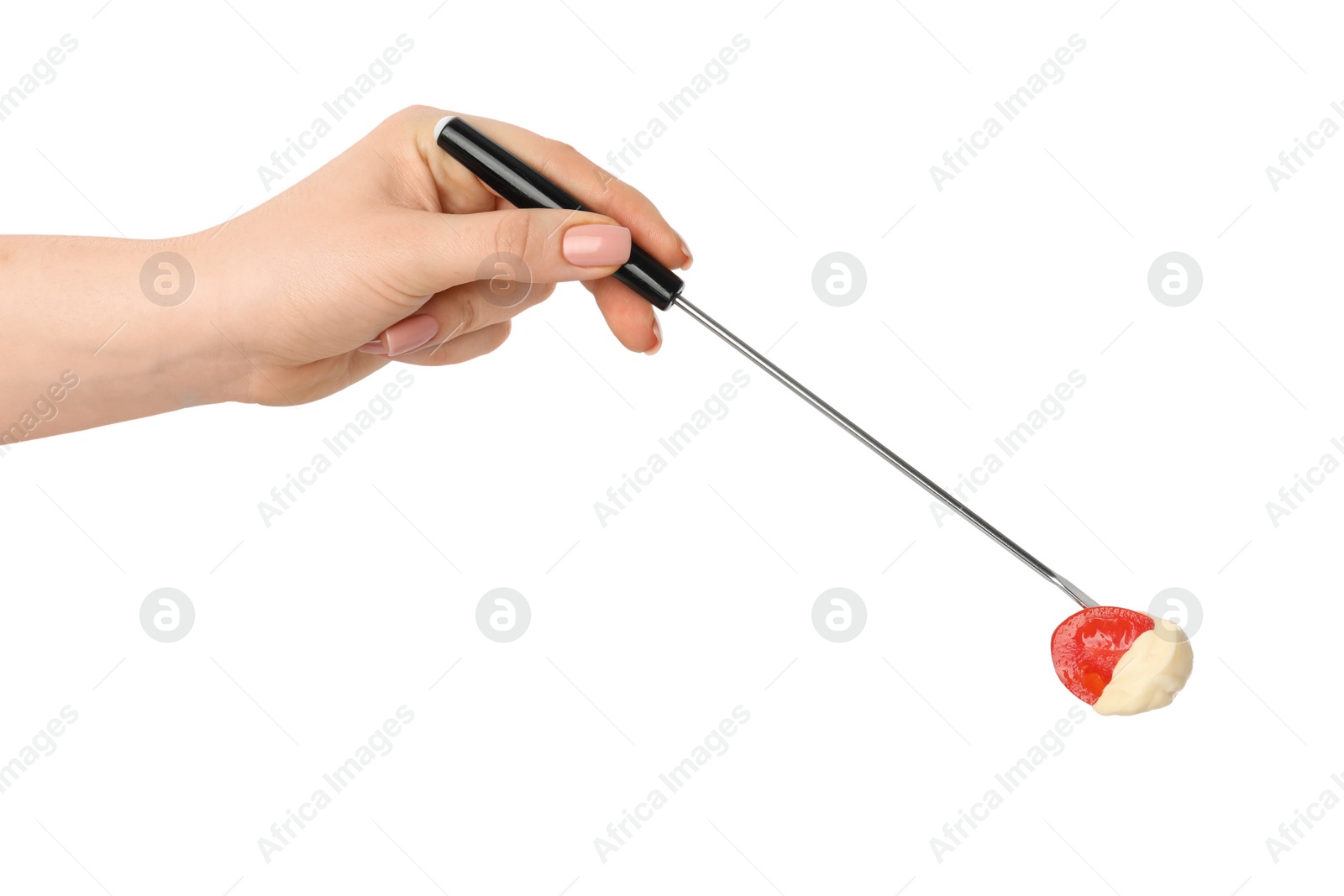 Photo of Tasty fondue. Woman holding fork with tomato and melted cheese on white background, closeup